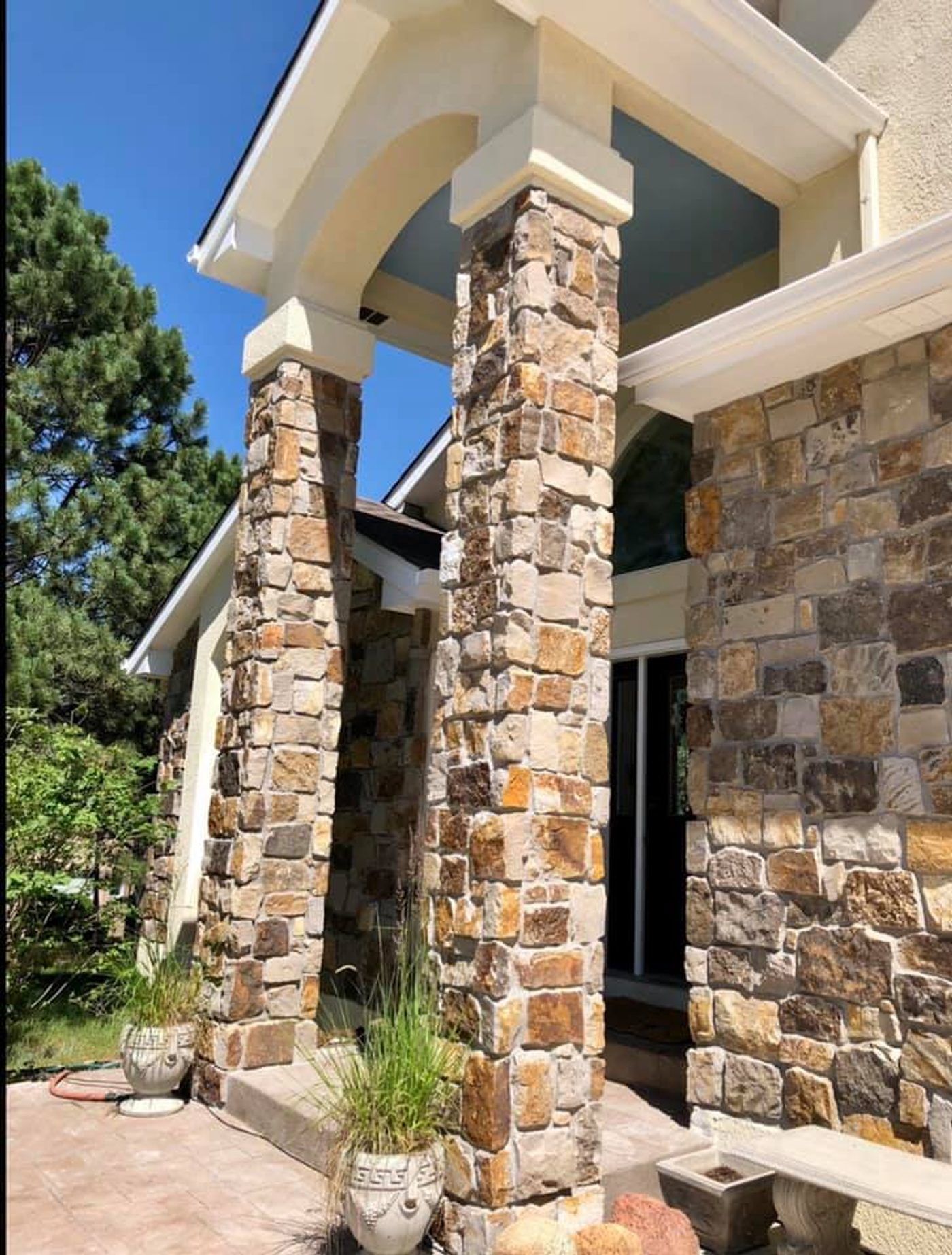 Stacked-stone entry columns by KC Stone Designs